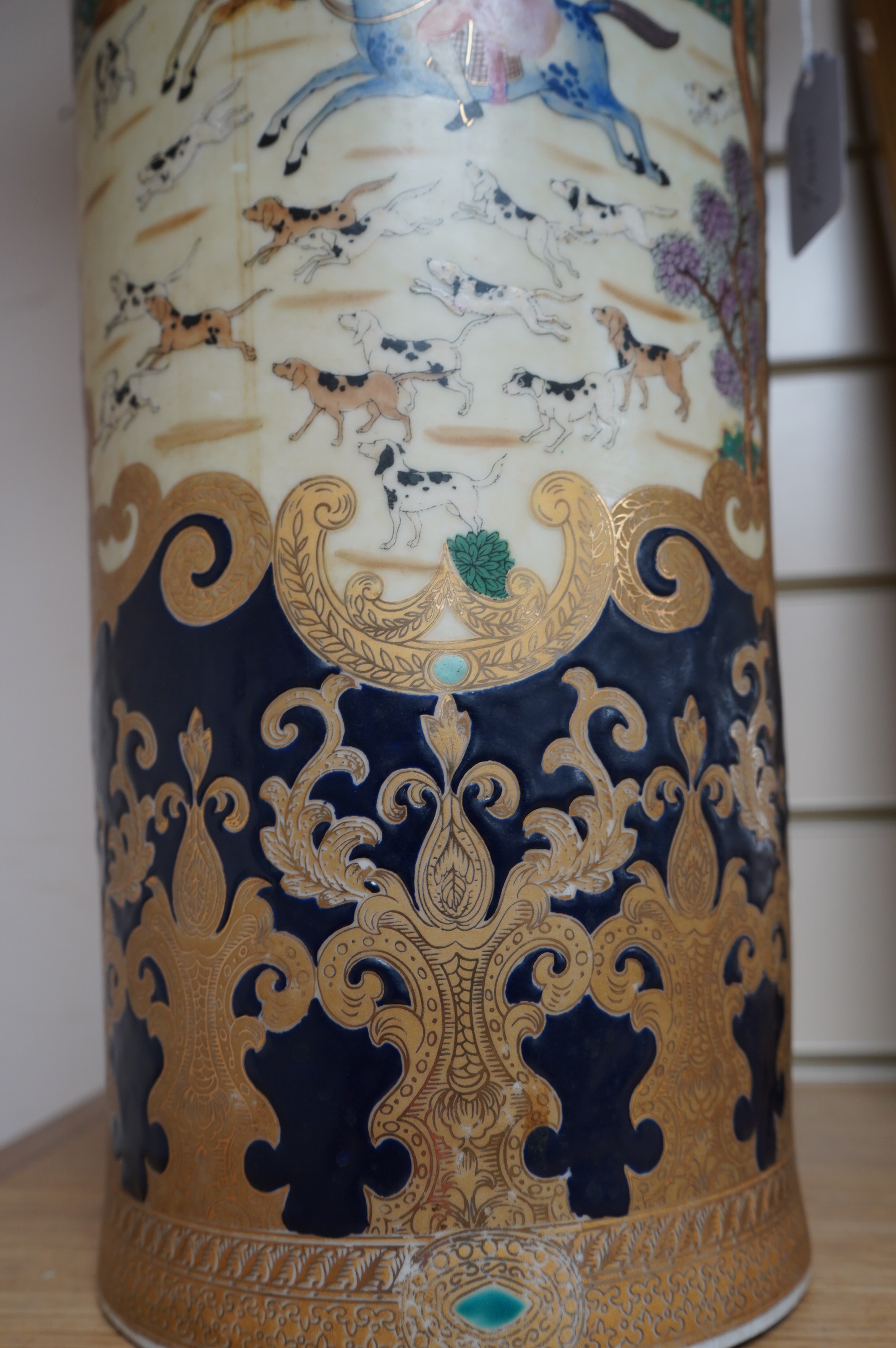 A 20th century Chinese vase decorated with figures on horseback, 63cm high. Condition - good